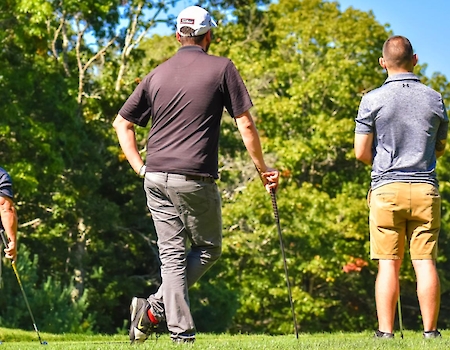 Guests enjoying a game of golf at The Preserve Sporting Club