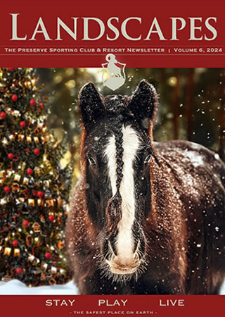 A snowy scene with a horse in front of a decorated Christmas tree on a magazine cover titled 