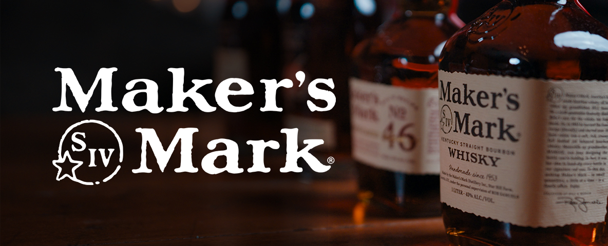 The image features bottles of Maker's Mark whiskey on a wooden surface, with one bottle clearly labeled.